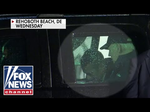 Biden seen being helped into SUV after COVID diagnosis